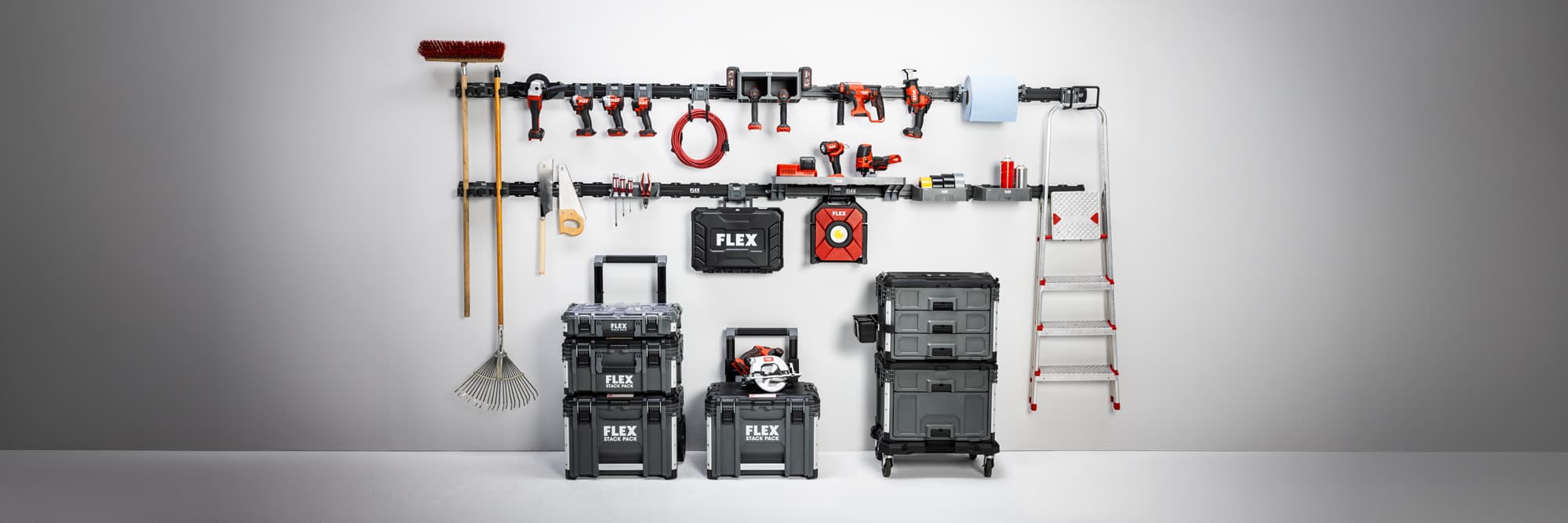 FLEX tool storage system with wall brackets, power tools, accessories, cleaning equipment, ladders and STACK PACK tool boxes.