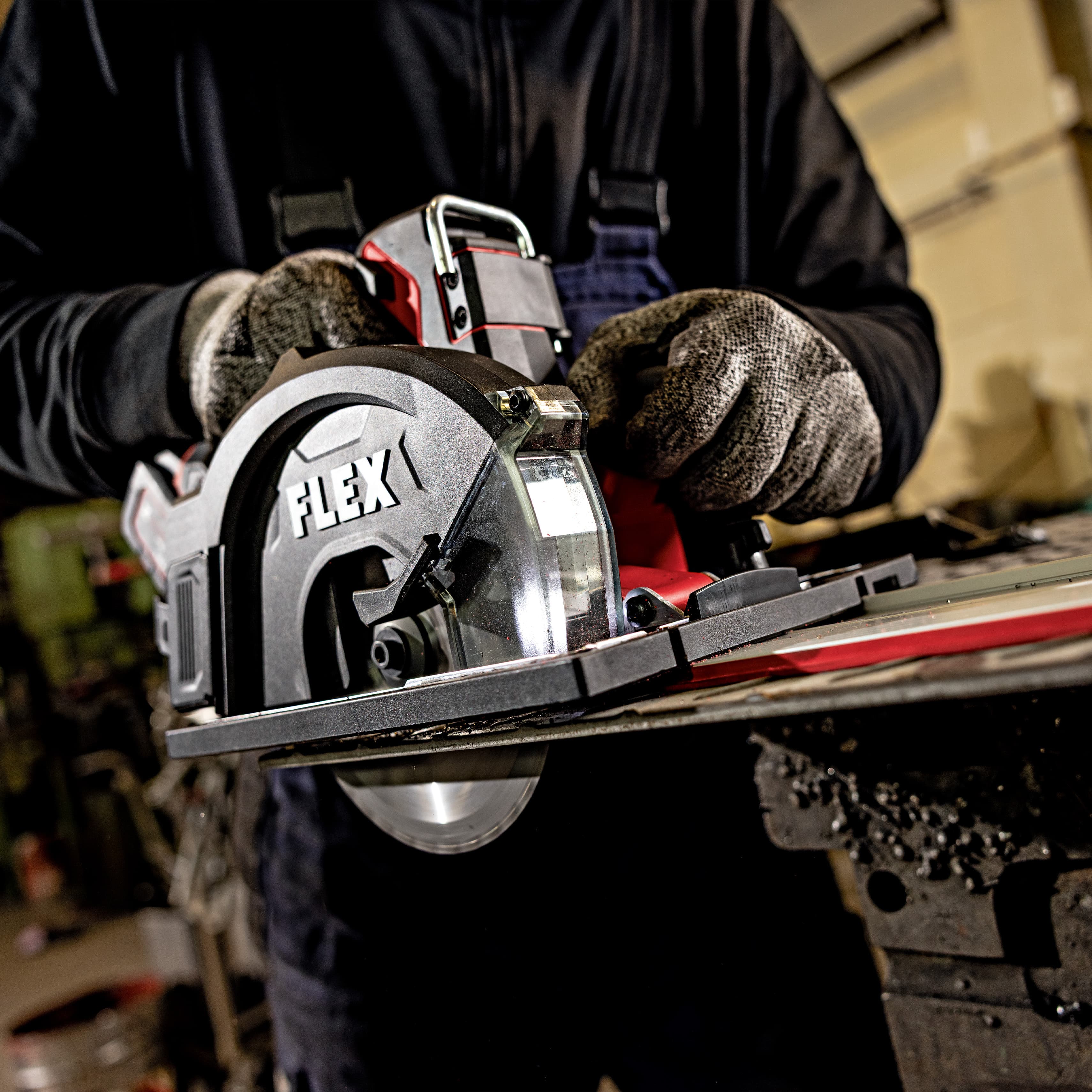 Metal is cut by a craftsman using the CSM 57 18-EC cordless metal circular saw