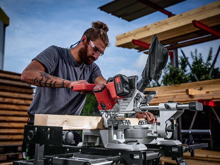 Robust cordless mitre saw on an outdoor construction site